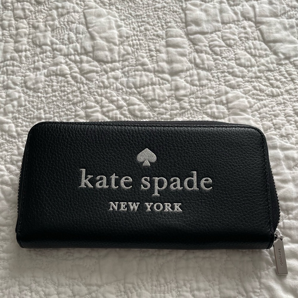 Kate Spade: black wallet with silver. Never used.